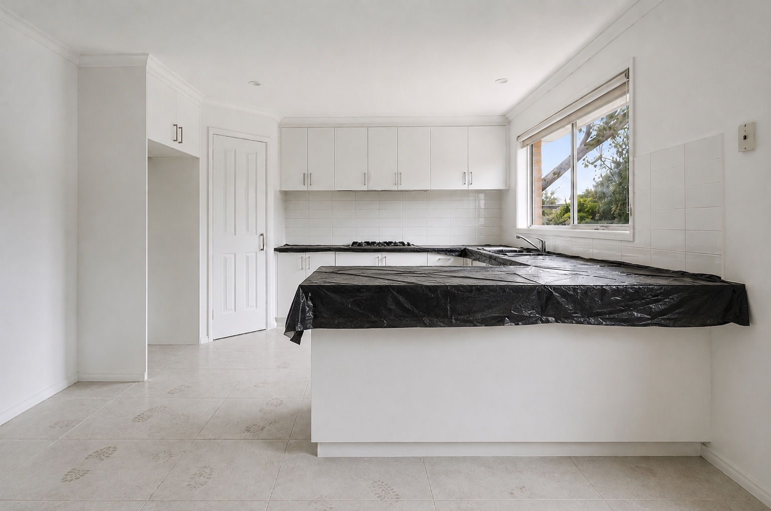 Kitchen before the Burwood home handover clean