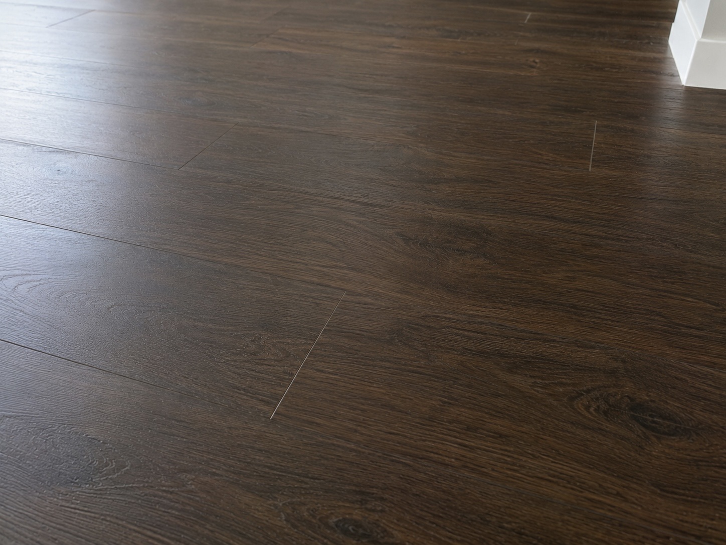 Dark timber floor after low-moisture construction handover cleaning