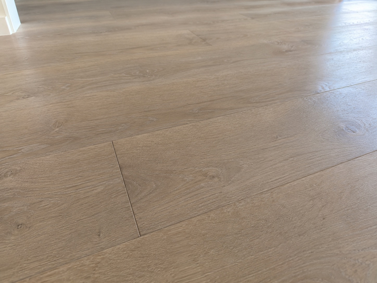 Clean light timber floor after a Sydney construction handover clean