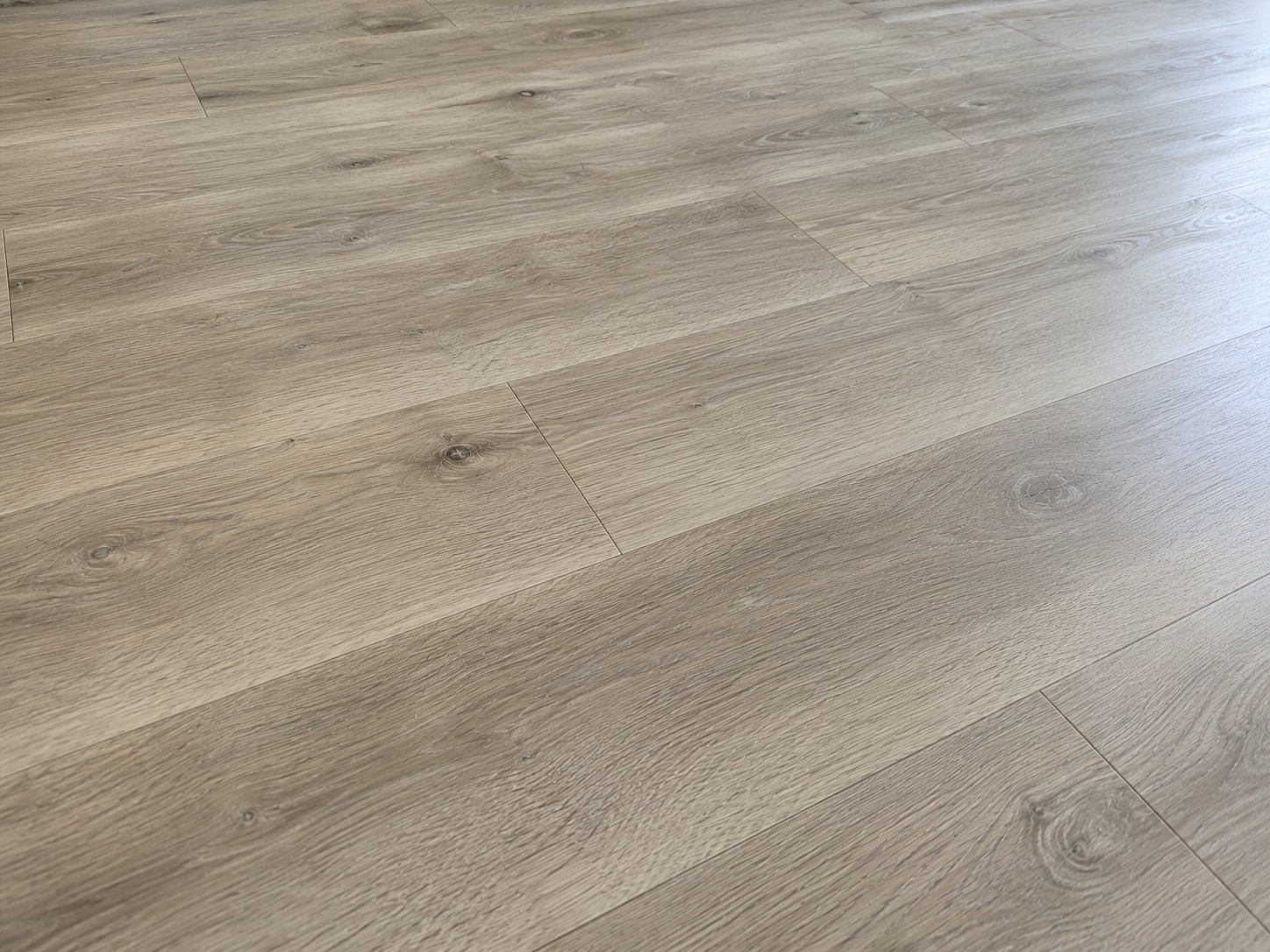 Vinyl plank floor after low-moisture construction cleaning for handover