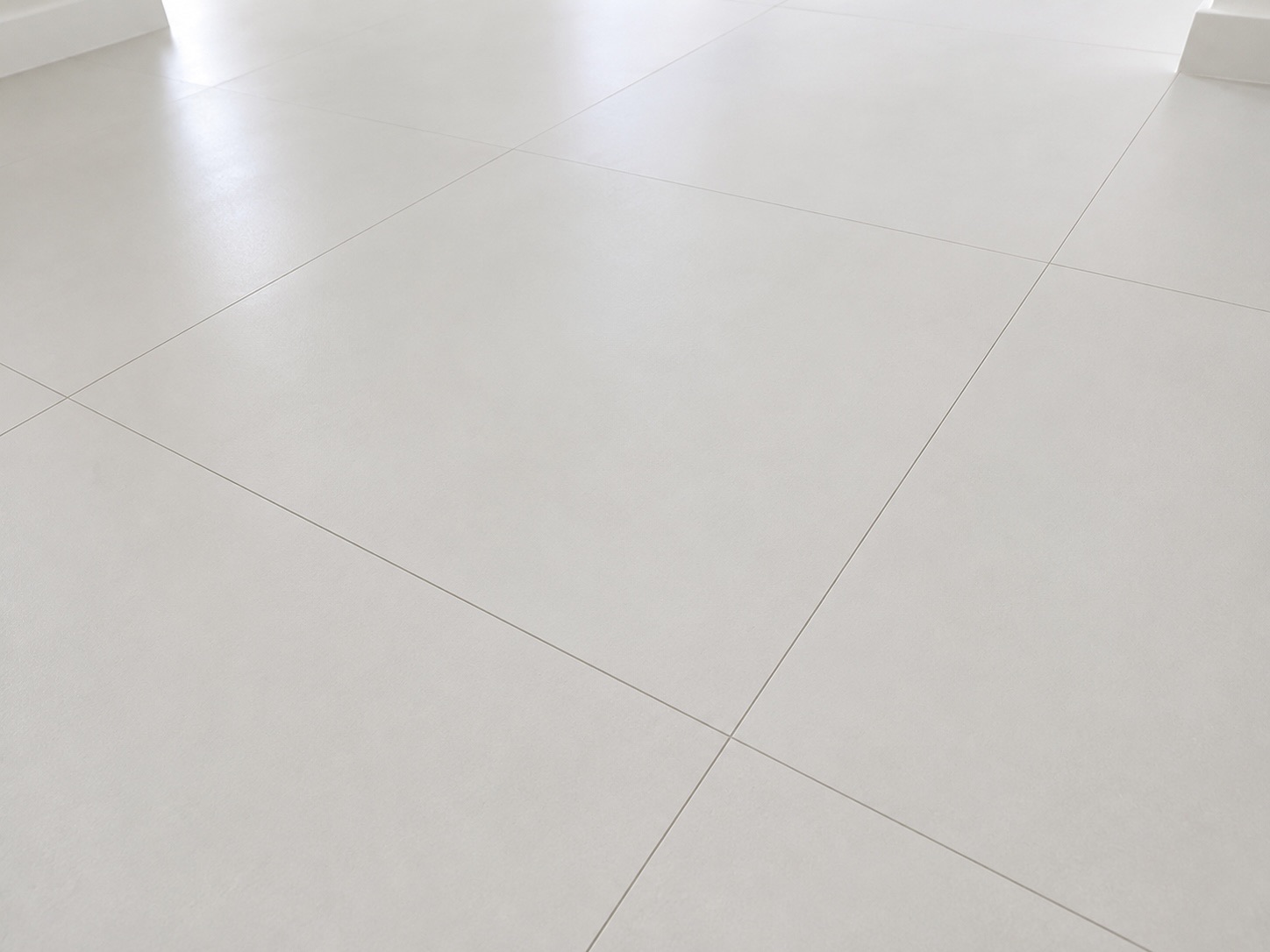 White tile floor clean and ready for handover inspection