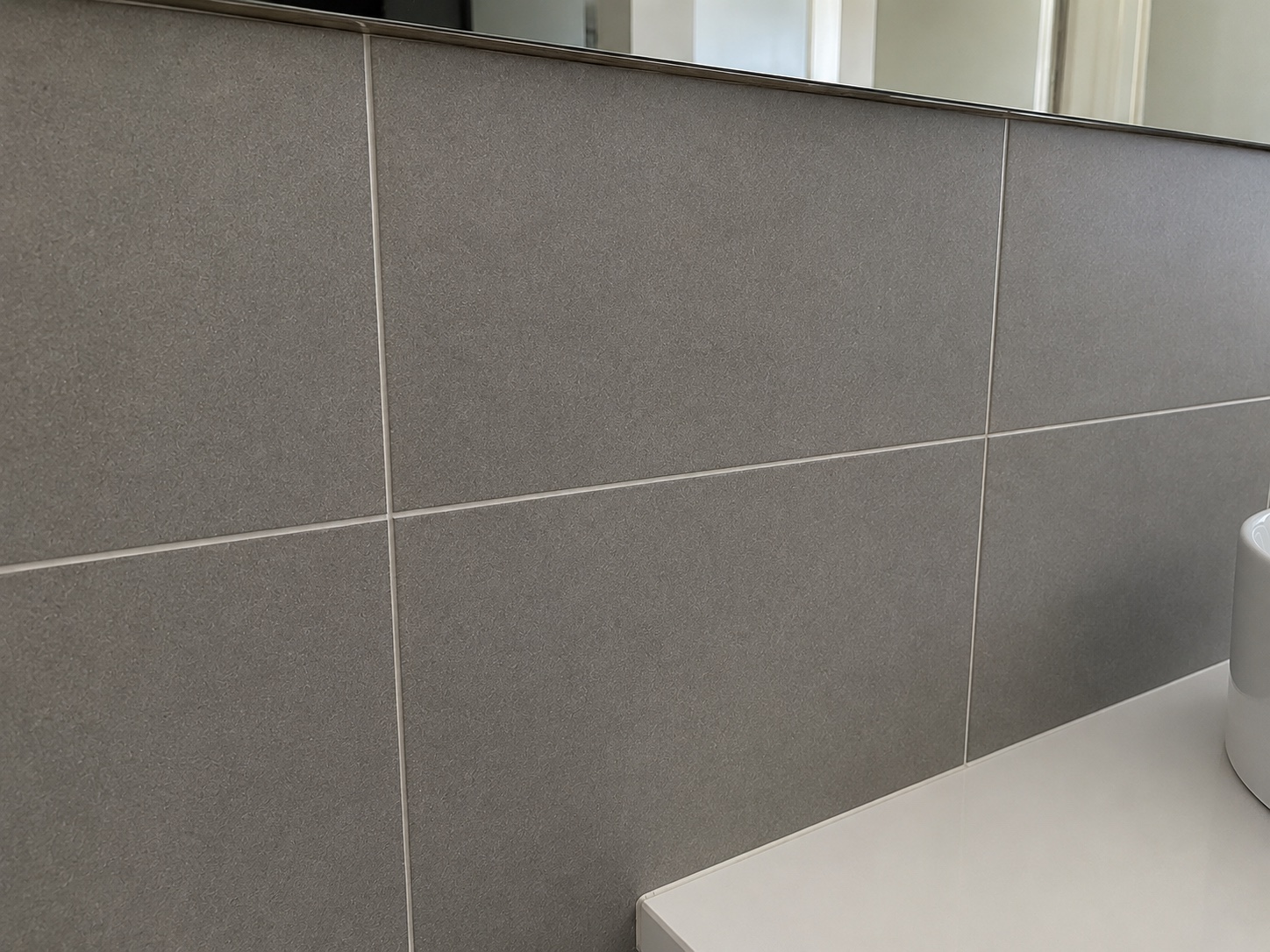 Tiled splashback clean after handover detailing